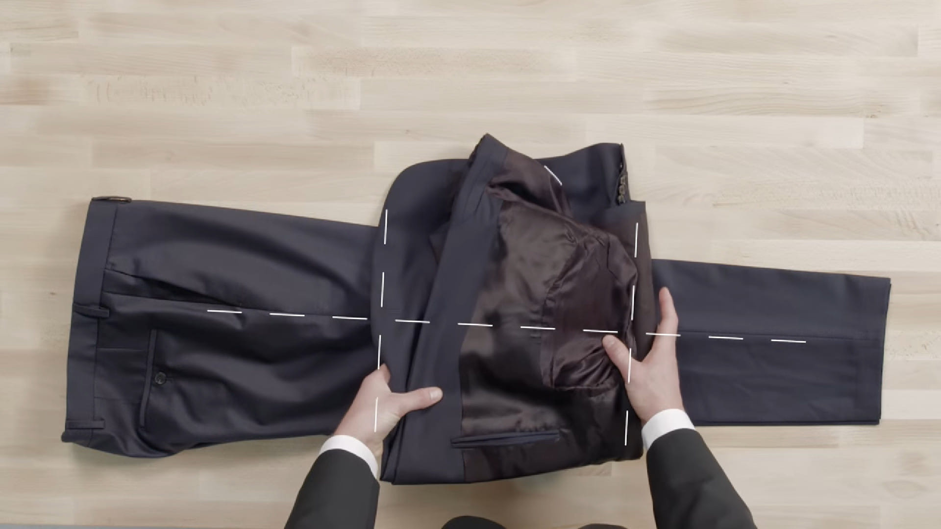 packing a suit in a backpack