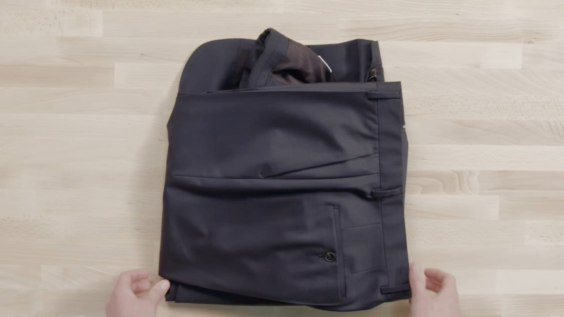 packing a suit in a backpack