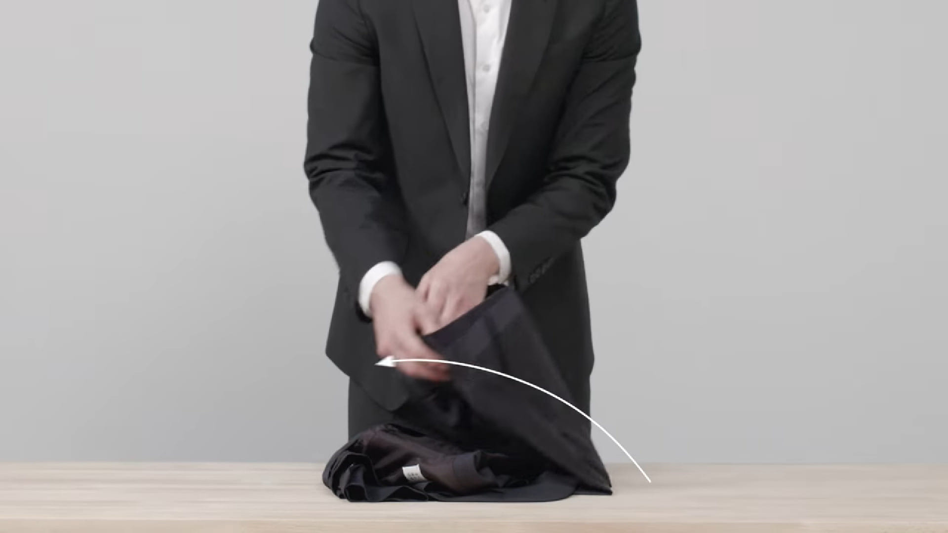 packing a suit in a backpack